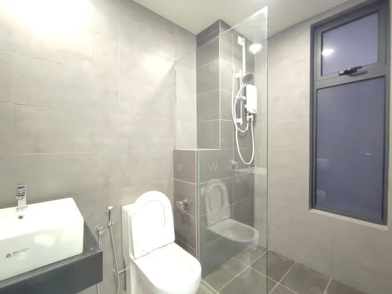 Bathroom features: grey tiled walls, grey tiled flooring, walk-in shower with glass enclosure, rain shower head, handheld shower, toilet, single-sink vanity with black countertop, mirror above sink, window with black frame; style: modern.