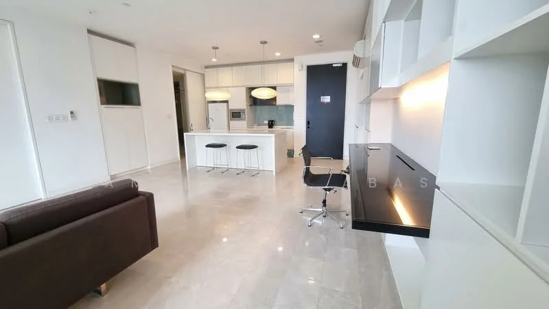 Living features: marble tile flooring, white painted walls, recessed downlights, sofa in brown fabric, open-plan layout with kitchen, built-in cabinetry, study desk with black surface, floor-to-ceiling windows, air conditioning unit; style: modern. Kitchen features: white cabinetry, island with bar seating for 3, stainless-steel appliances, built-in oven, refrigerator, ceramic cooktop, pendant lighting, white countertops; style: modern.