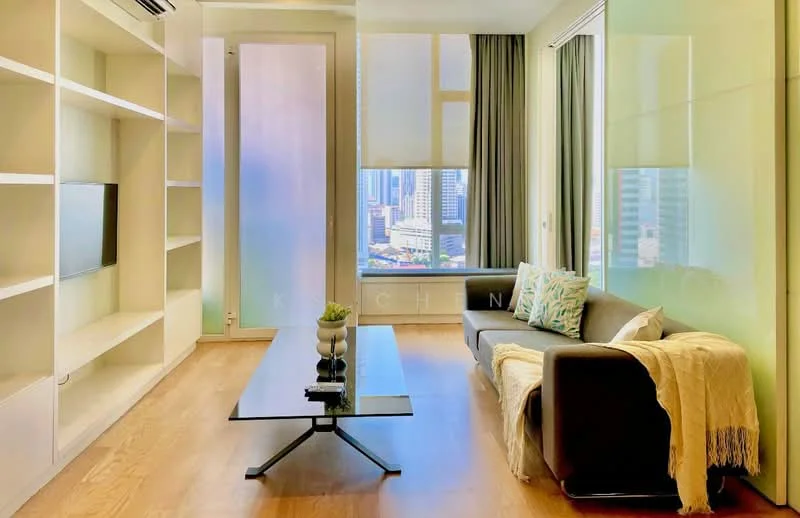 Living features: floor-to-ceiling windows, city view, light wood flooring, grey fabric sofa, glass coffee table, built-in shelving unit, wall-mounted TV, curtains, decorative cushions; style: modern.