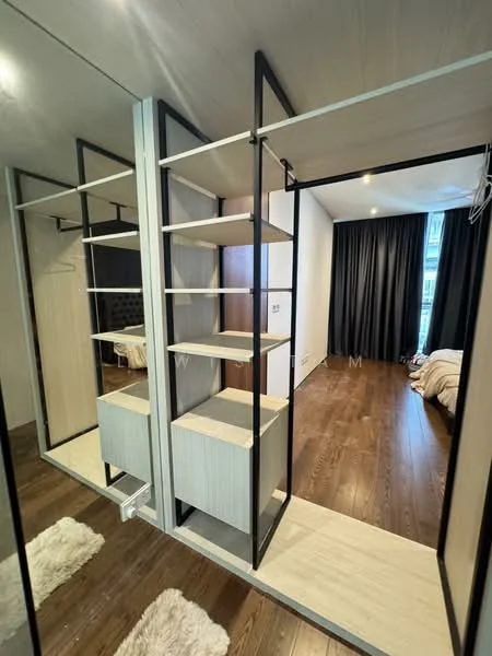Room features: built-in wardrobe with open shelving, mirrored sliding doors, wooden flooring, neutral wall colour, recessed downlights, black metal frame, white cabinetry, soft area rug; style: modern.