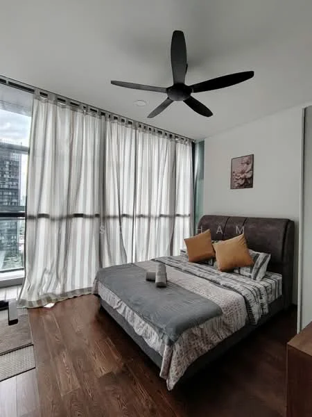 Bedroom features: king-size bed with upholstered headboard, grey bedspread, two decorative cushions in orange, wooden flooring, 5-blade ceiling fan, floor-to-ceiling windows with sheer curtains, wall-mounted artwork, nightstand with decorative items; style: modern; view: city.