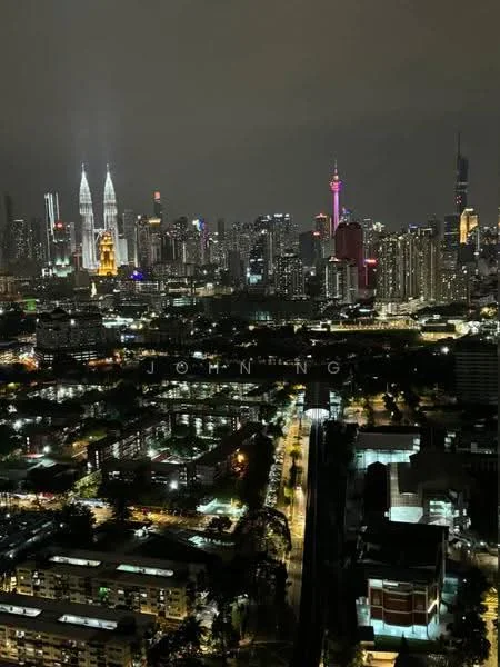 Exterior features: city skyline, night view, illuminated buildings, Petronas Twin Towers, KL Tower, urban landscape, street lights, high-rise buildings, green spaces; style: modern.