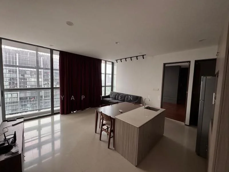 Living features: floor-to-ceiling windows, grey curtains, light-coloured walls, polished tile flooring, sofa in dark grey, dining table with four chairs, kitchen island with sink, recessed ceiling lights; style: modern; view: city. Room features: doorway leading to another room, refrigerator visible.