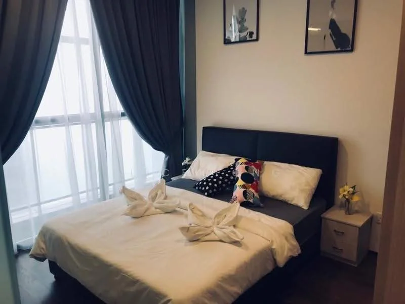 Bedroom features: queen-size bed, upholstered headboard, white bedding, decorative throw pillows, nightstand with drawer, framed artwork on walls, floor-to-ceiling windows, sheer curtains, dark grey curtains, laminate flooring, table lamp, decorative flowers in vase; style: modern.