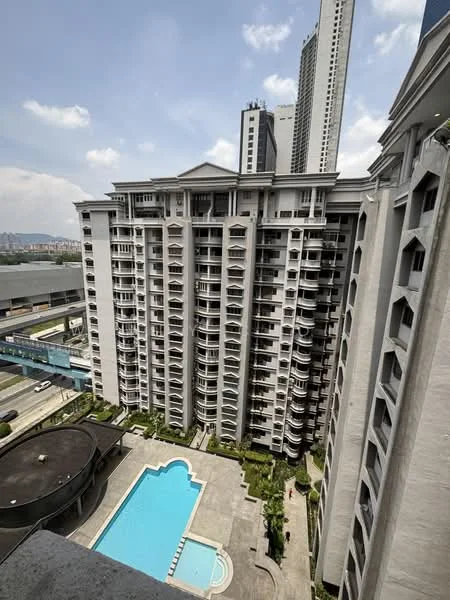 Exterior type: high-rise condominium; features: white painted facade, recessed balconies, glass windows, infinity pool, pool deck with loungers, manicured landscaping, surrounded by mature greenery, adjacent to main road; style: modern.