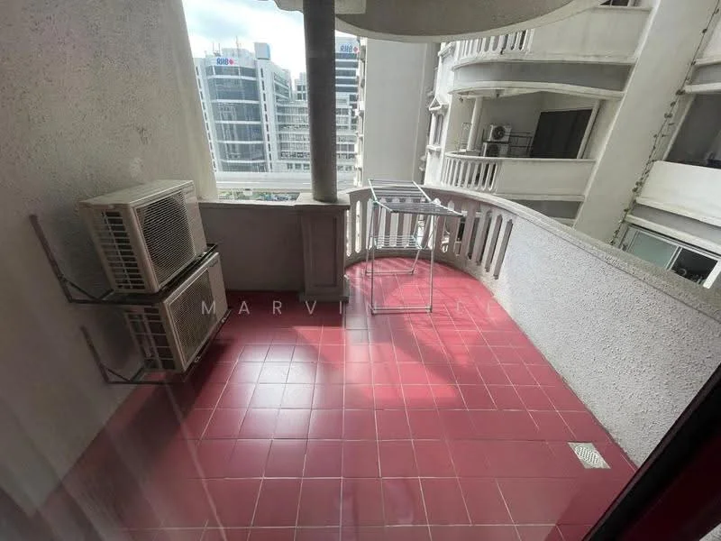 Balcony features: red tiled flooring, concrete walls, railing with vertical balusters, window air conditioning unit, metal drying rack; view: city.
