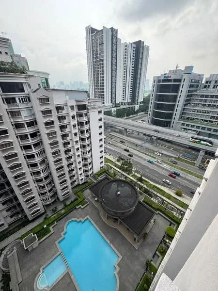 Exterior type: high-rise condominium; features: infinity pool, pool deck with loungers, surrounding landscaping with greenery, multiple high-rise buildings in background, view of highway, modern architectural design, glass curtain wall, balconies on residential units; style: modern.
