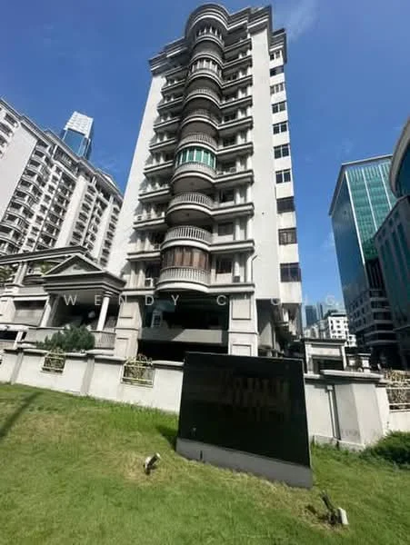 Exterior type: mid-rise condominium; features: white painted facade, balconies on each floor, glass curtain wall sections, manicured lawn in front, surrounded by urban landscape, multiple storeys, modern architectural design; style: modern.