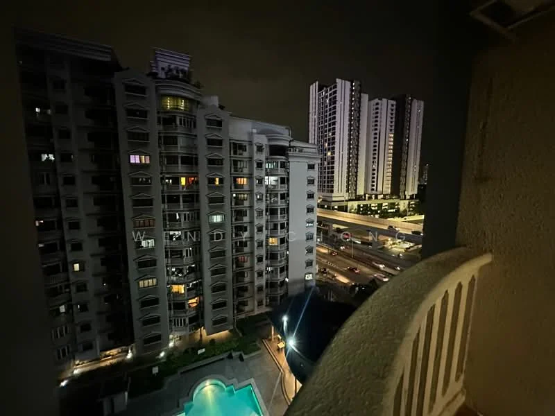 Room features: balcony with railing, night view of city skyline, swimming pool visible below, high-rise buildings in proximity, street view with traffic, outdoor lighting, concrete wall, floor-to-ceiling windows; style: modern; view: city.