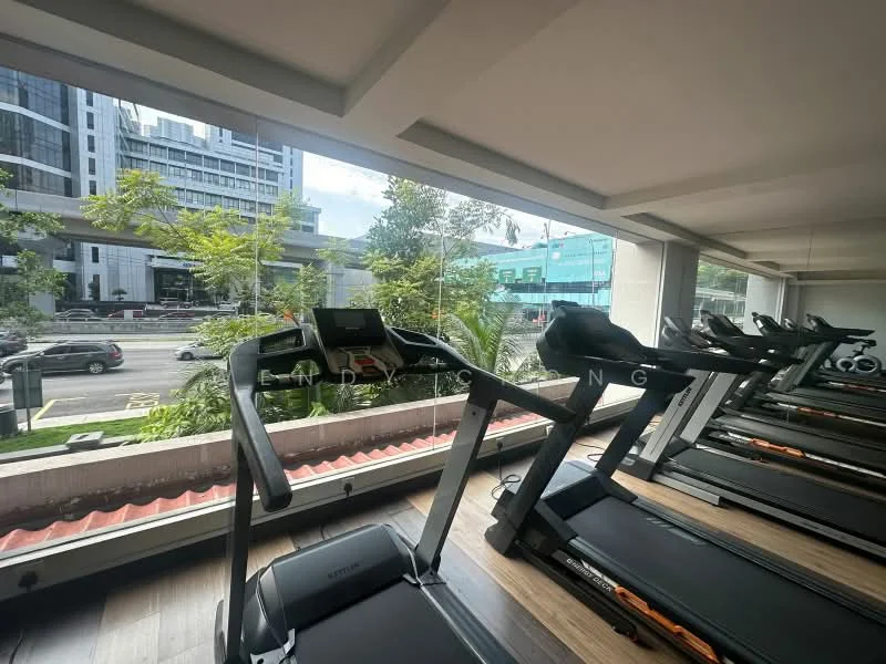 Room features: treadmills, large windows, wooden flooring, urban view, modern fitness equipment, greenery outside, natural light, contemporary design; style: modern; view: city.