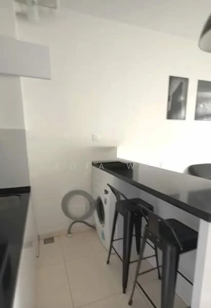 Kitchen features: black granite countertop, white cabinetry, stainless-steel washing machine, bar stools, white walls, tile flooring, recessed lighting, framed artwork on walls; style: modern.