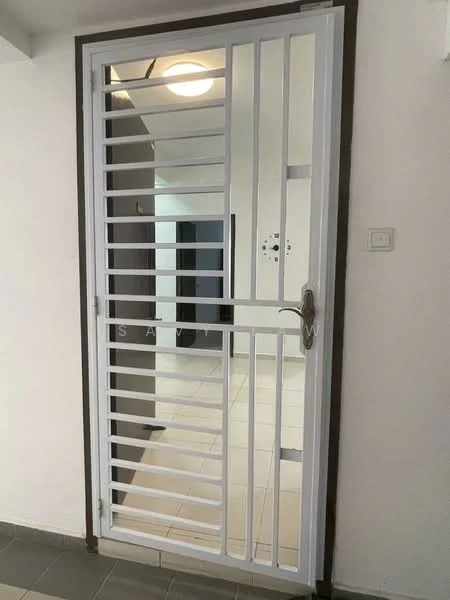 Room features: security grille door, white painted door frame, light fixture on ceiling, tiled flooring, neutral wall color, open space beyond the door; style: modern.