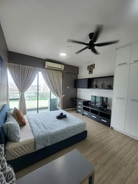 Bedroom features: queen-size bed, upholstered headboard, 2 bedside pillows, ceiling fan with 5 blades, floor-to-ceiling windows, sheer curtains, built-in wardrobe with sliding doors, wall-mounted TV, study desk, wooden flooring, decorative wall art; style: modern; view: city.