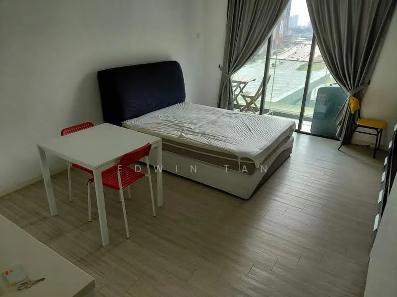 Bedroom features: queen-size bed with upholstered headboard, white bedding, wooden flooring, floor-to-ceiling windows, sheer curtains, small dining table with white top and red chairs, black accent wall behind bed, balcony access, view of city skyline, decorative wall art, built-in wardrobe; style: modern; view: city.