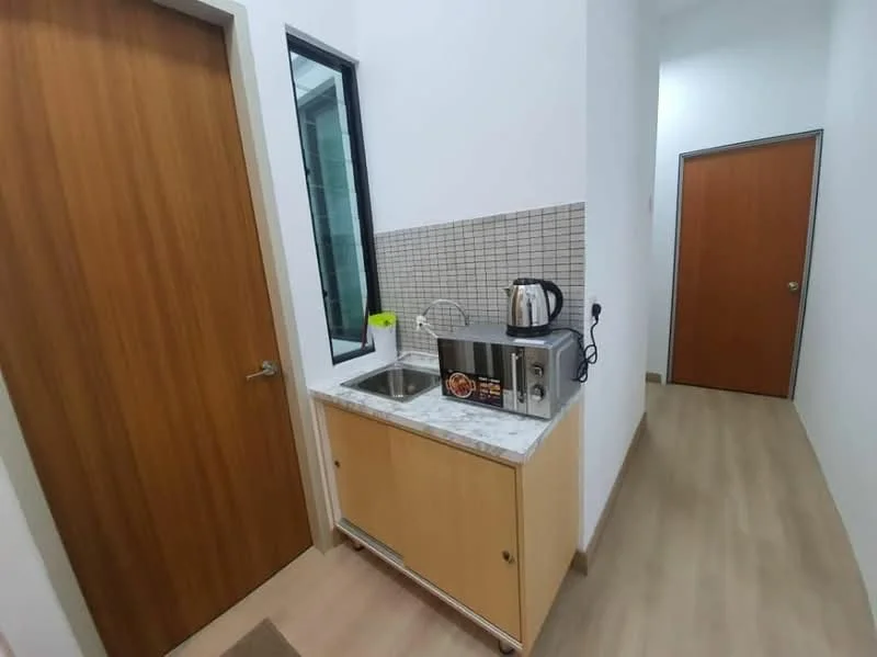 Kitchen features: single-bowl stainless-steel sink, chrome pull-down faucet, marble countertop, wood cabinetry, microwave, kettle, tile backsplash, vinyl plank flooring, white painted walls, window, door, light switch; style: modern. Hallway features: white painted walls, vinyl plank flooring, door, light switch.