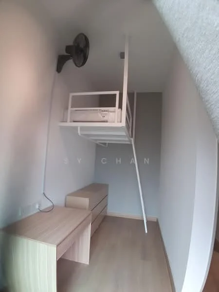 Room features: lofted bed with white metal frame, wooden desk, wooden dresser, light wood flooring, white painted walls, ceiling fan, single light fixture, minimalist design; style: minimalist.