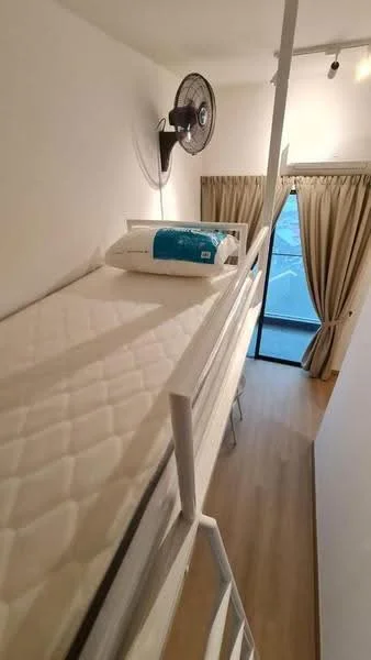 Room features: bunk bed with mattress, white metal bed frame, wooden flooring, wall-mounted ceiling fan, floor-to-ceiling window, curtains, light fixtures on ceiling, white painted walls; style: modern.