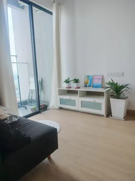 Living features: large floor-to-ceiling windows, white painted walls, light wood flooring, black fabric sofa, white sideboard with glass panels, decorative plants on sideboard, framed artwork on sideboard, potted plant in white planter, sheer curtains, balcony access; style: modern; view: city.