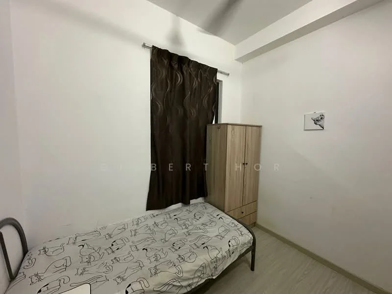 Bedroom features: single bed with patterned bedding, wooden wardrobe, brown curtain, white painted walls, laminate flooring, ceiling fan.