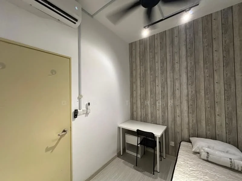 Bedroom features: wood panel accent wall, white painted walls, laminate flooring, single bed with bedding, study desk with chair, wall-mounted air conditioning unit, recessed downlights, ceiling fan; style: modern.