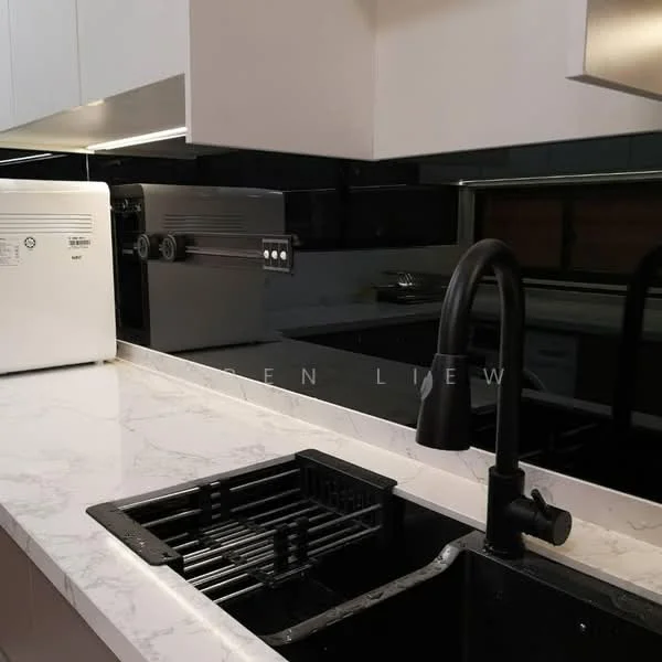 Kitchen features: black gooseneck faucet, single-bowl stainless-steel sink, white marble countertop, black backsplash, built-in microwave, white refrigerator, black cabinetry, undermount sink, kitchen island, recessed lighting; style: modern.