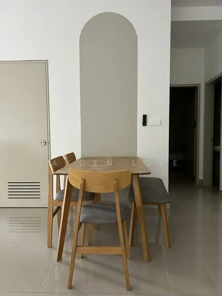 Dining features: wooden dining table, 4 wooden dining chairs, grey upholstered chair, white painted walls, cream accent wall, tile flooring, wall-mounted intercom, door to adjacent room, decorative archway; style: modern.