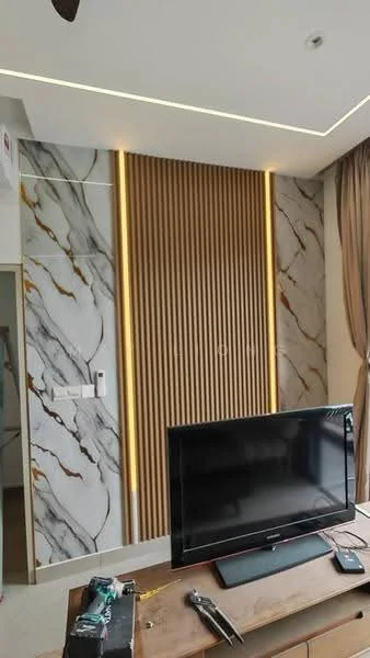 Living features: marble accent wall with gold veining, wood paneling with integrated lighting, recessed ceiling lights, flat-screen TV, wooden coffee table, light-colored flooring, curtains, decorative wall features; style: modern.