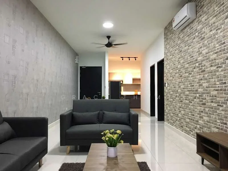 Living features: grey fabric 3-seater sofa, wooden coffee table, area rug, decorative houseplants, white painted walls, exposed brick accent wall, recessed downlights, ceiling fan, wall-mounted split AC, tile flooring; style: modern. Room features: white painted walls, tile flooring, doorway leading to kitchen, doorway leading to hallway.