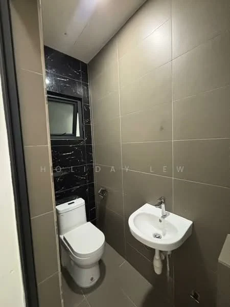 Bathroom features: one-piece toilet, wall-mounted sink, chrome basin mixer faucet, black accent wall with marble pattern, light grey tiled walls, grey tiled flooring, mirror above sink, window for natural light; style: modern.