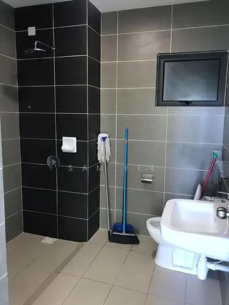 Bathroom features: black tiled shower wall, grey tiled walls, white toilet, chrome shower head, glass window, tile flooring, toilet paper holder, cleaning supplies, squeegee, broom; style: modern.