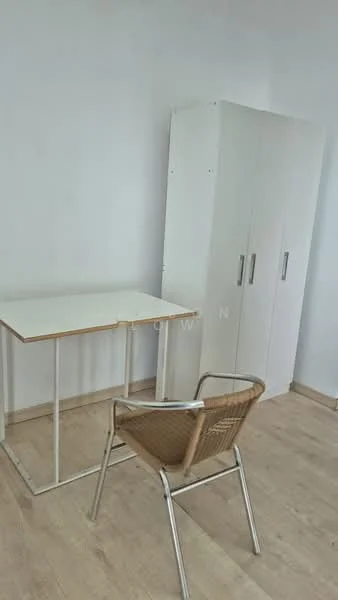 Room features: white walls, light wood flooring, white wardrobe with handles, simple desk with metal frame, metal chair with woven seat; style: minimalist.