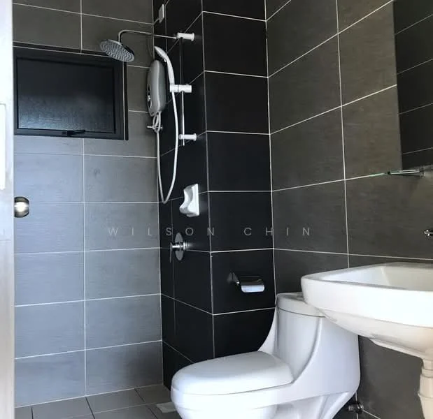 Bathroom features: grey tiled walls, white ceramic toilet, glass shelf, shower area with wall-mounted shower head, built-in shower mixer, grey tiled flooring, mirror above sink, white sink with pedestal; style: modern.