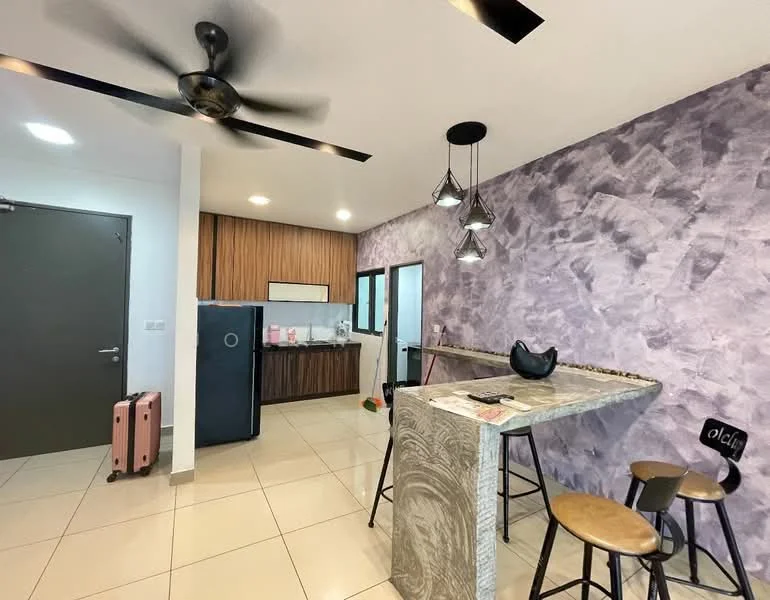 Kitchen features: grey accent wall, white tiled flooring, ceiling fan, pendant lighting, bar counter with stone surface, two wooden bar stools, built-in kitchen cabinetry, stainless-steel fridge, open layout to living area; style: modern.