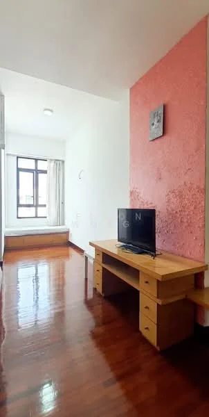 Room features: wooden flooring, white painted walls, accent wall in coral, large window with sheer curtains, built-in window seat, wooden desk with drawers, TV on desk, ceiling light fixture; style: modern.