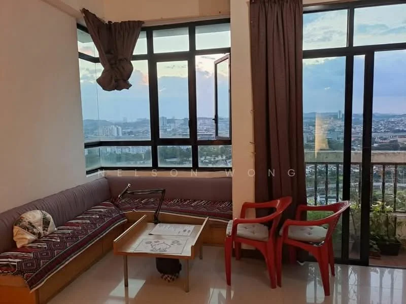 Living features: large floor-to-ceiling windows, city skyline view, grey fabric sofa with patterned cushions, wooden coffee table, two red plastic chairs, curtains in brown, white walls, glossy tile flooring; style: modern; view: city.