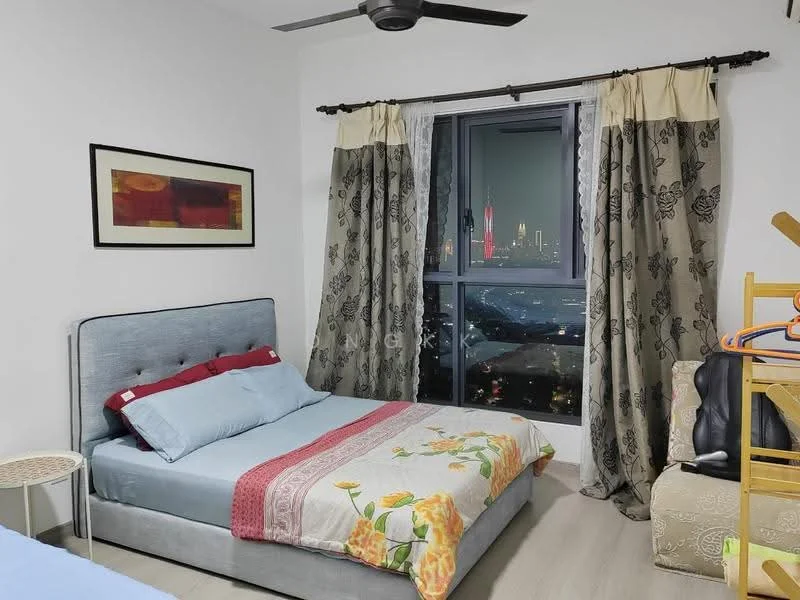 Bedroom features: king-size bed with upholstered headboard, bedding in light blue and floral patterns, decorative throw pillows, floor-to-ceiling window, curtains with floral pattern, wooden flooring, wall-mounted ceiling fan, framed artwork on wall, small round side table, dressing table with mirror, clothes rack; style: modern; view: city.