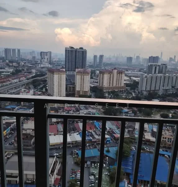Exterior type: high-rise condominium; features: city skyline view, balcony railing, surrounding urban landscape, multiple high-rise buildings, roadway visible below, cloudy sky, distant buildings, mixed-use development; style: modern.