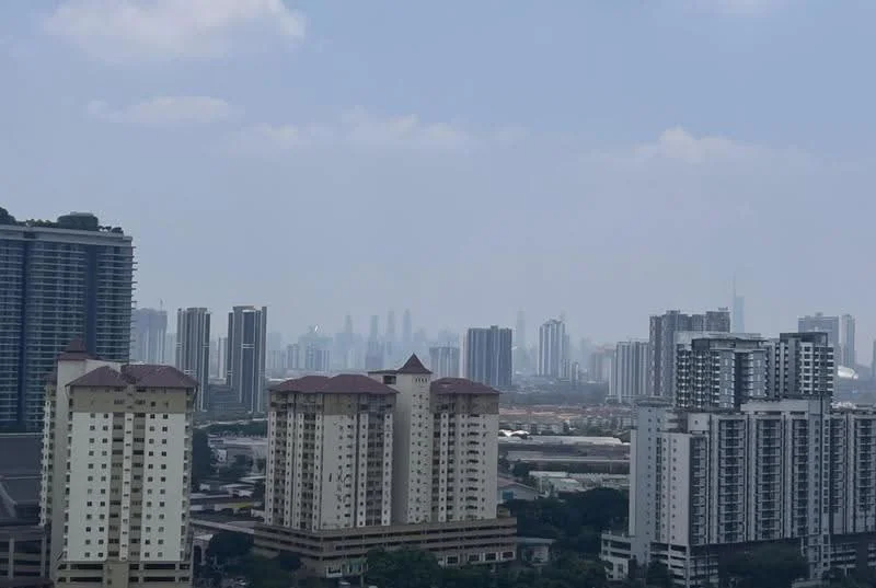 Exterior type: high-rise condominium; features: city skyline view, multiple high-rise buildings, mixed architectural styles, urban landscape, surrounded by greenery; style: modern.
