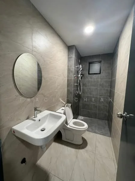 Bathroom features: white wall-mounted sink, chrome basin mixer faucet, one-piece toilet, shower with handheld showerhead, grey tile flooring, grey wall tiles, round mirror, recessed ceiling lights, window for ventilation; style: modern.