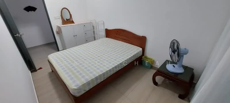 Bedroom features: queen-size bed with wooden frame, mattress with checkered pattern, wooden bedside table, table fan, full-length mirror on dresser, white painted walls, light-colored tiled flooring, wardrobe or storage cabinet, yellow waste bin.