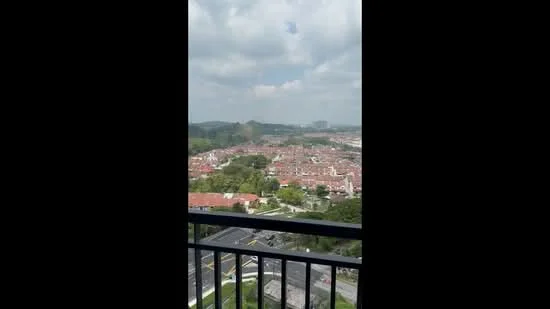 Exterior type: high-rise condominium; features: balcony with railing, city view, surrounded by greenery, urban landscape, cloudy sky, residential buildings in view; style: modern.