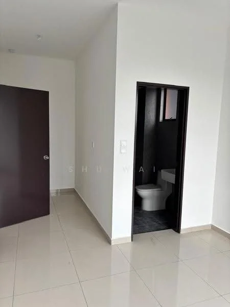 Room features: white painted walls, glossy ceramic tile flooring, dark wooden door, light switch, doorway leading to bathroom, toilet visible through doorway; style: modern.
