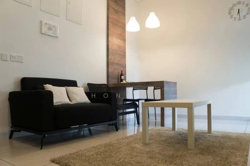 Living features: black fabric sofa, 2 decorative cushions, white coffee table, light beige area rug, wood accent wall, pendant lighting, wall clock, dining table with 2 chairs, wine bottle on table; style: modern.