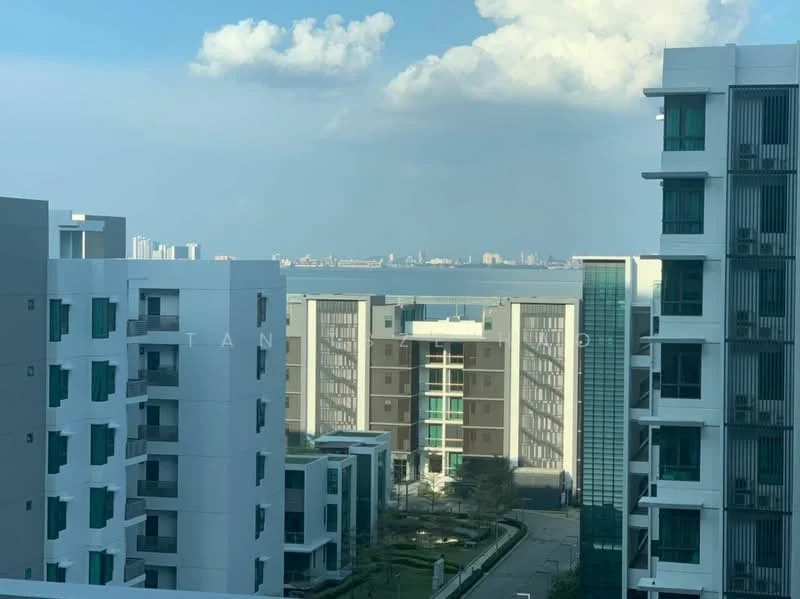 Exterior type: high-rise condominium; features: glass curtain wall, white painted facade, green balcony railings, landscaped garden area, city skyline view, surrounded by water, multiple storeys, modern architectural design; style: modern.