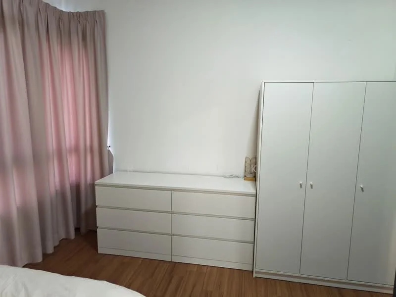 Bedroom features: white dresser with six drawers, white wardrobe with two doors, light pink curtains, wooden flooring, white walls; style: minimalist.