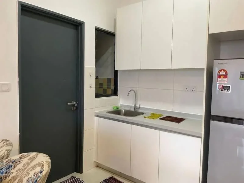 Kitchen features: white cabinetry, stainless-steel sink, chrome faucet, white tiled backsplash, grey countertop, built-in refrigerator, wall-mounted cabinet, floor tiles, green dish soap, kitchen towel, decorative rug; style: modern.