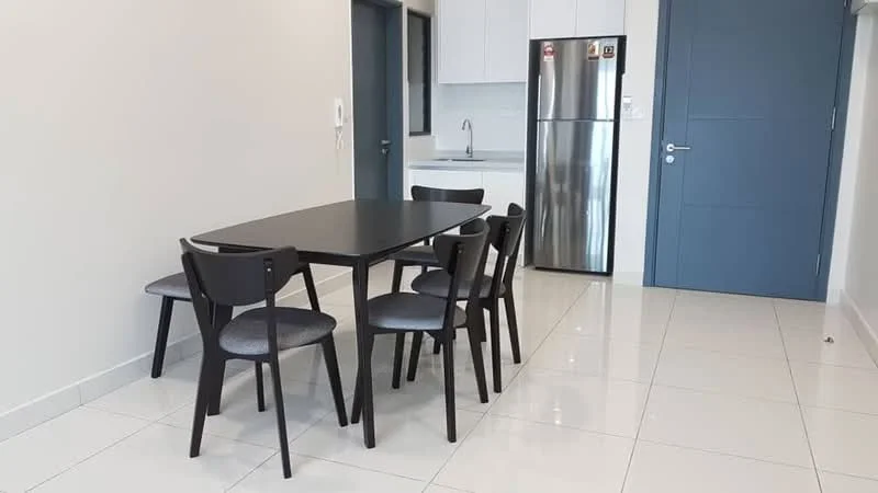 Dining features: black dining table, 6 black dining chairs with grey upholstery, white painted walls, glossy white tile flooring, refrigerator, kitchen area visible in background, single-bowl stainless-steel sink, wall-mounted cabinets, grey countertop, door to adjacent room; style: modern.