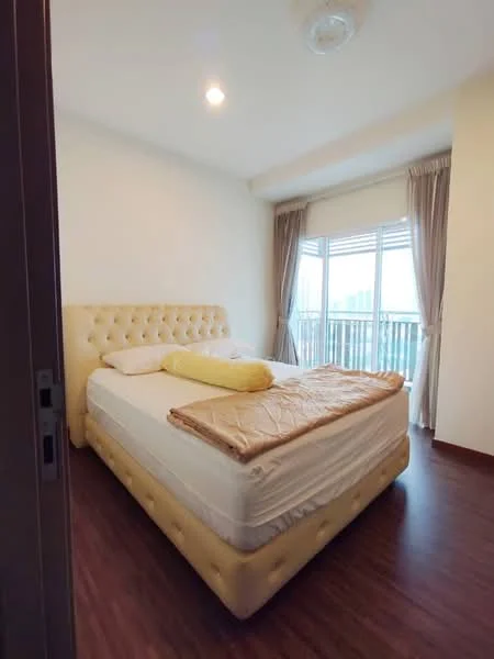 Bedroom features: queen-size bed with upholstered headboard, light-colored bedding, wooden flooring, floor-to-ceiling windows, sheer curtains, recessed downlights, decorative ceiling rose, balcony access, city view; style: modern; view: city.