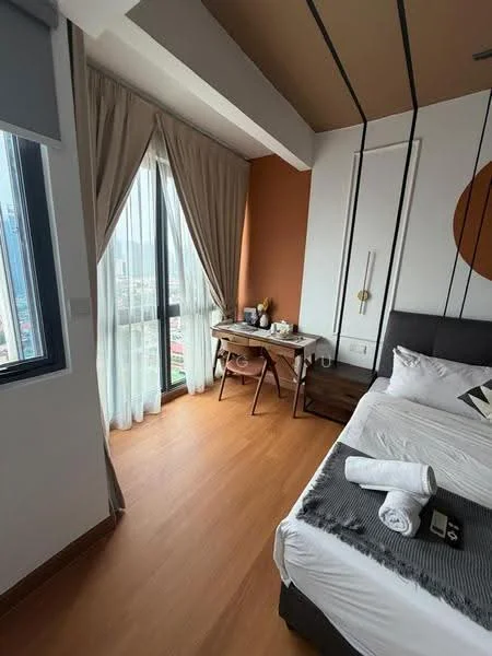 Bedroom features: queen-size bed with white bedding, upholstered headboard, wooden flooring, floor-to-ceiling windows, sheer curtains, brown accent wall, desk with chair, decorative wall art, table lamp, built-in wardrobe; style: modern; view: city.