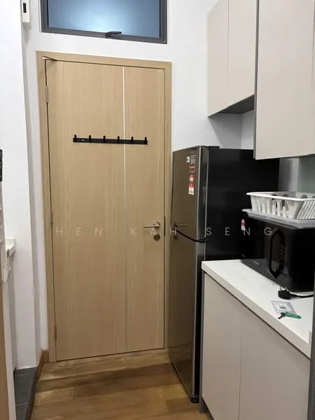 Kitchen features: white cabinetry, stainless-steel fridge, black microwave, white countertop, wooden flooring, door with hook rack, wall-mounted shelf, sink, window above sink; style: modern.